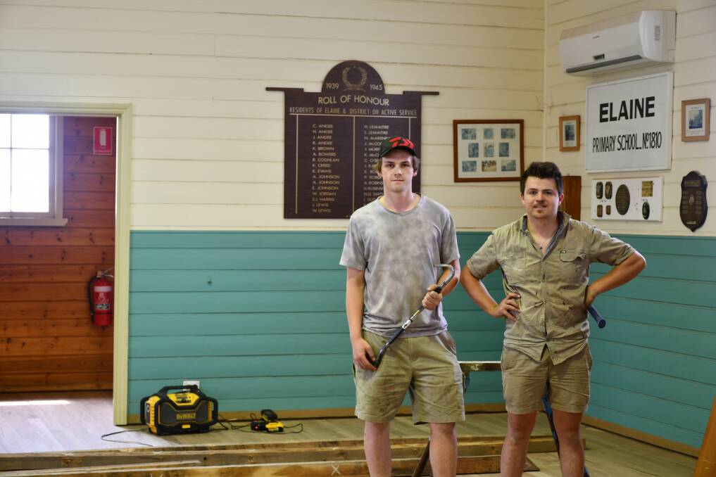 Tradies Kade Morrison and Andrew Christoforou have been working on repairing the floor at the Elaine Mechanics Institute Hall.