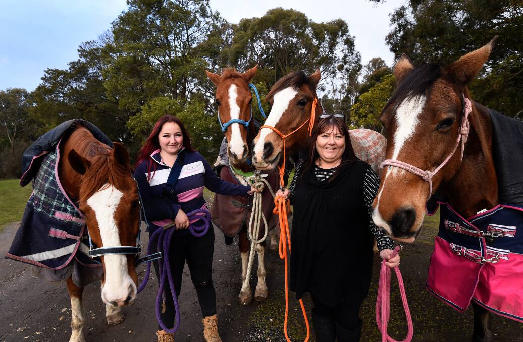 Riding on the horses: Tori (with Ziggy and Doc) and Samantha Wilson (with Clancy and Willee) are organising a trail ride, raising money to support people with MND. Picture: Adam Trafford