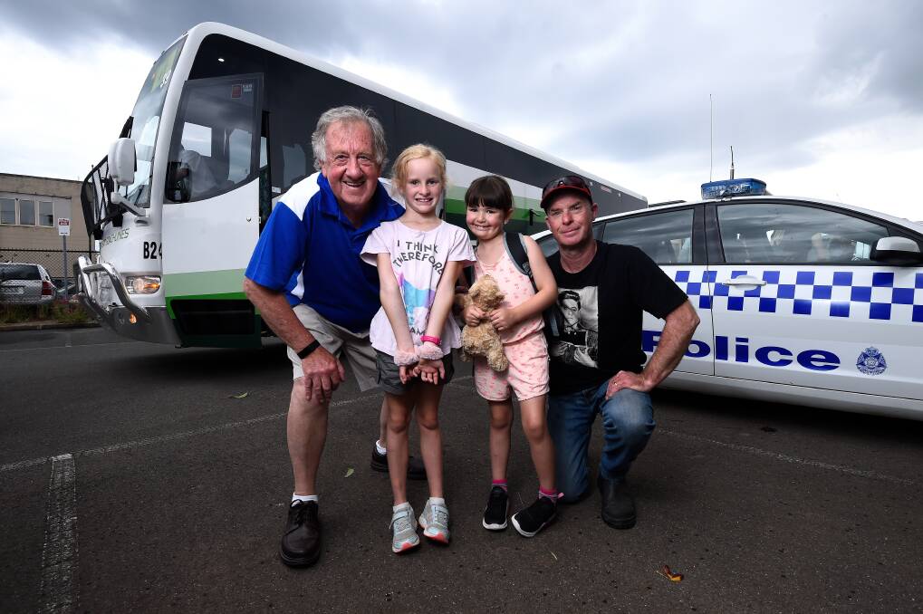 Ready to roll: Retired policeman John Moloney, kids Emily Pickles and Rose Matthews with her dad Adam Matthews. Picture: Adam Trafford