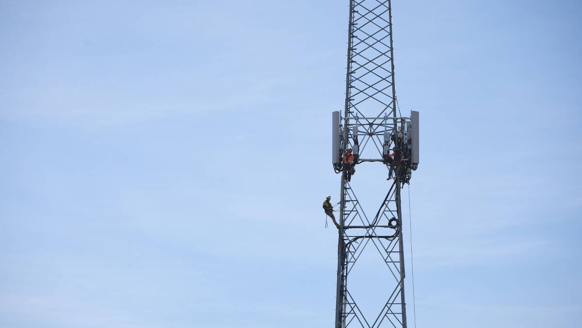 Workers fix a mobile phone tower in Ballarat Central. File photo