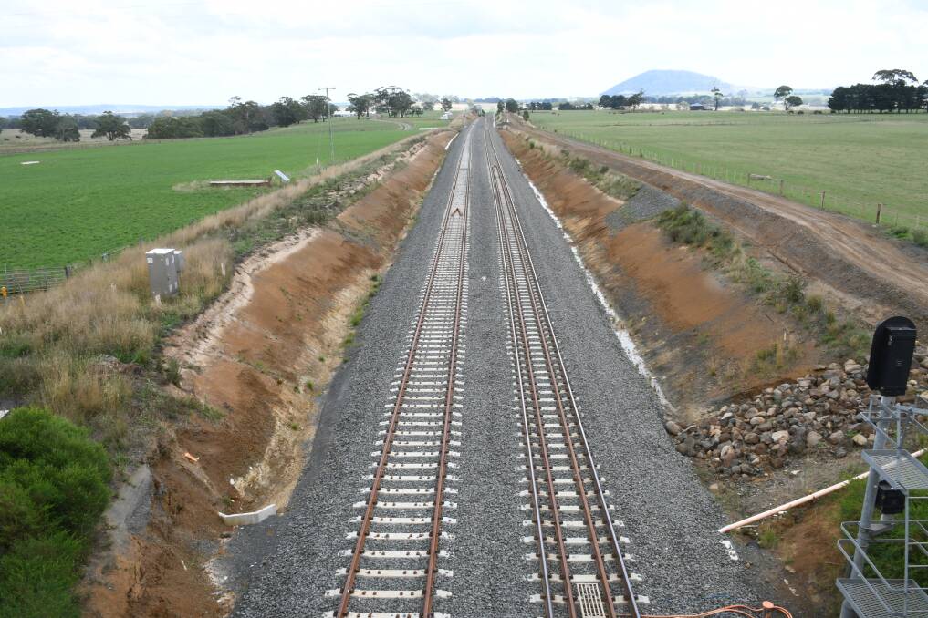 The Ballarat rail line near Bungaree, with Mount Warrenheip in the background.