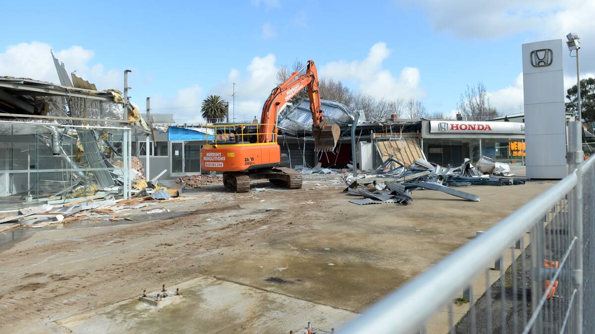 Demolition gets under way. Picture: Kate Healy