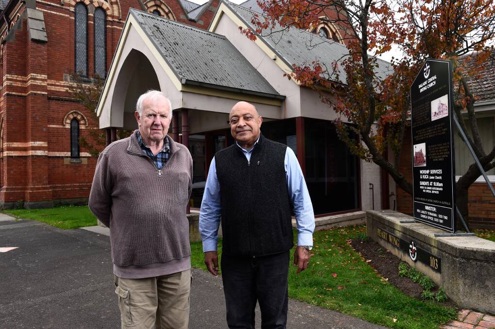 Volunteer Geoff Le Marshall and Ballarat Central Uniting Church minister Lauleti Tu'inauvai. Picture by Adam Trafford