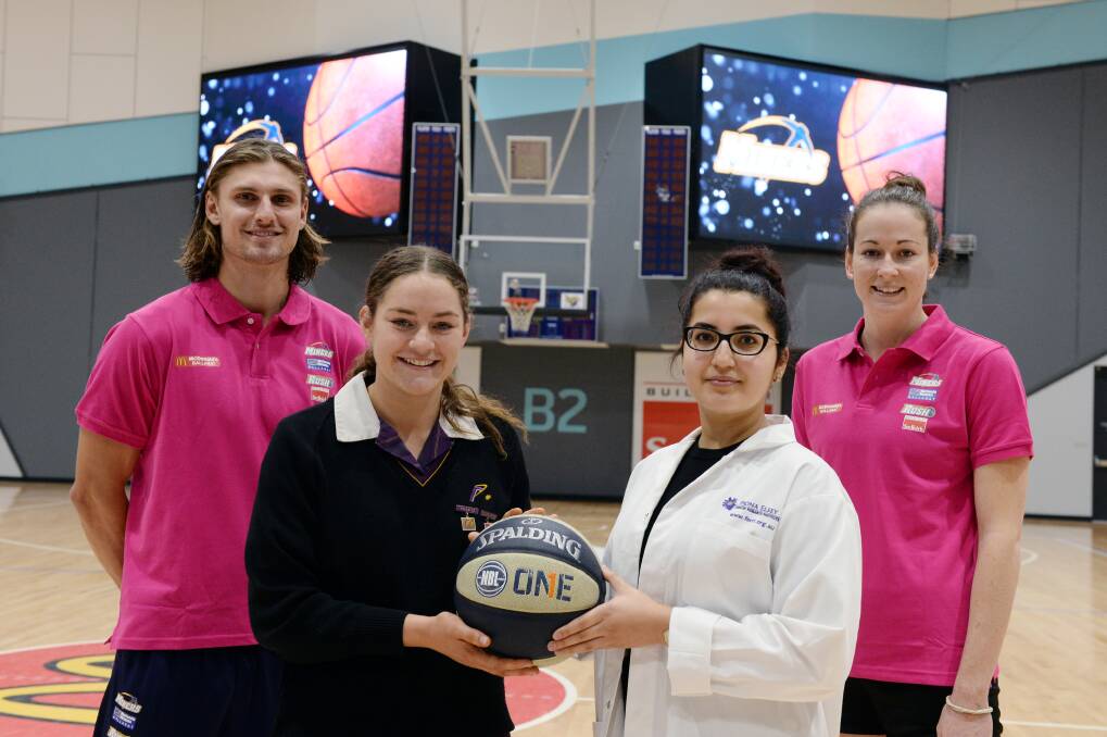 Doing their part: Miner Matt Kenyon, Phoenix year 12 student Tahlia Watts, FECRI research assistant Farah Ahmady, and the Rush's Alicia Froling. Picture: Kate Healy