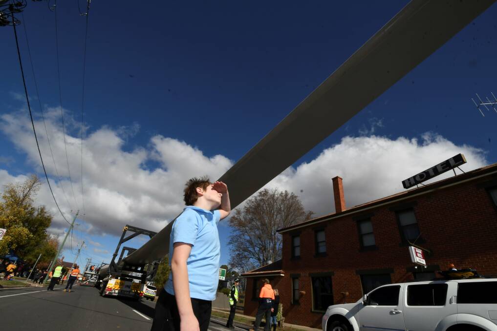 Looking ahead: Renewable energy in western Victoria has a huge role to play, according to GNeT's Roadmap to Zero Emissions plan - pictured, Trawalla Primary School student James checks out a wind turbine component in Beaufort last year. Picture: Lachlan Bence