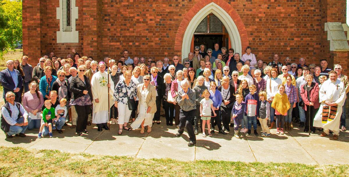 Goodbye: Parishioners and friends gather with Bishop Pual Bird for one final mass at St Joseph's Catholic Church in Learmonth. Picture: contributed