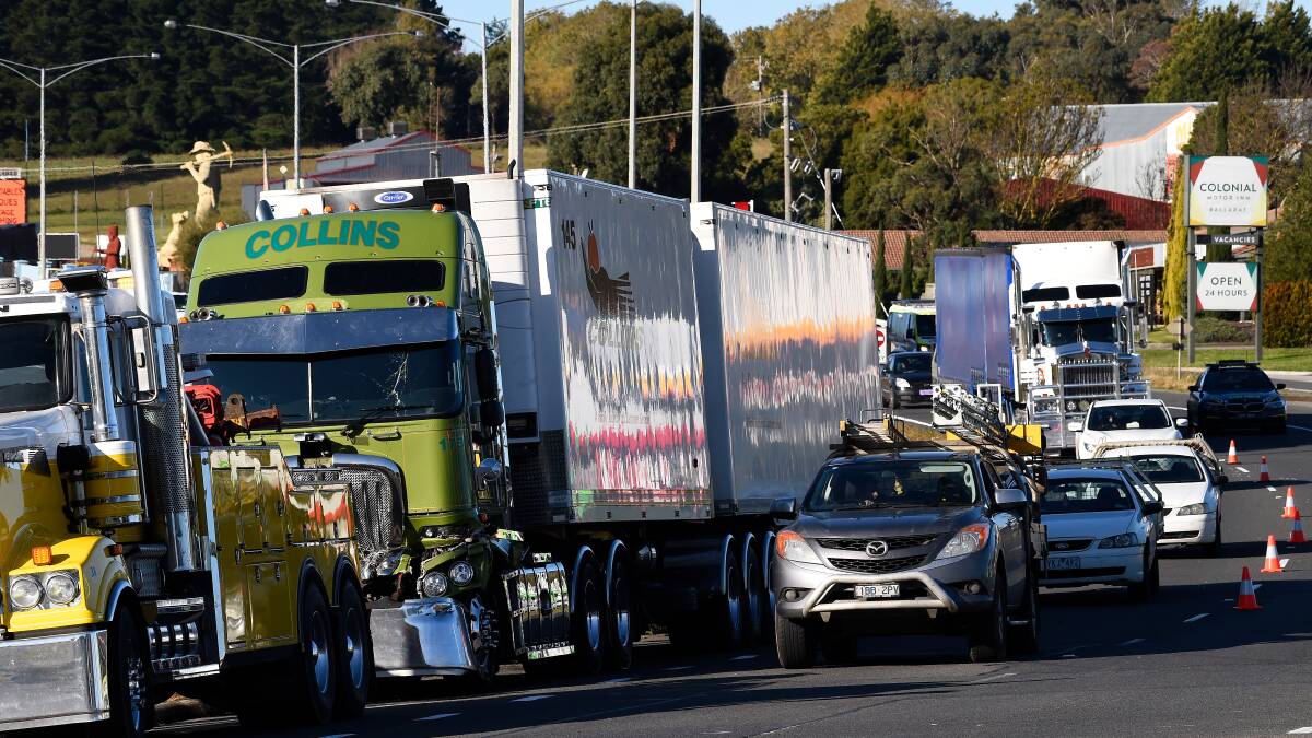 'Feel like I've cheated death': Lucky escape as trucks collide and crash into petrol station