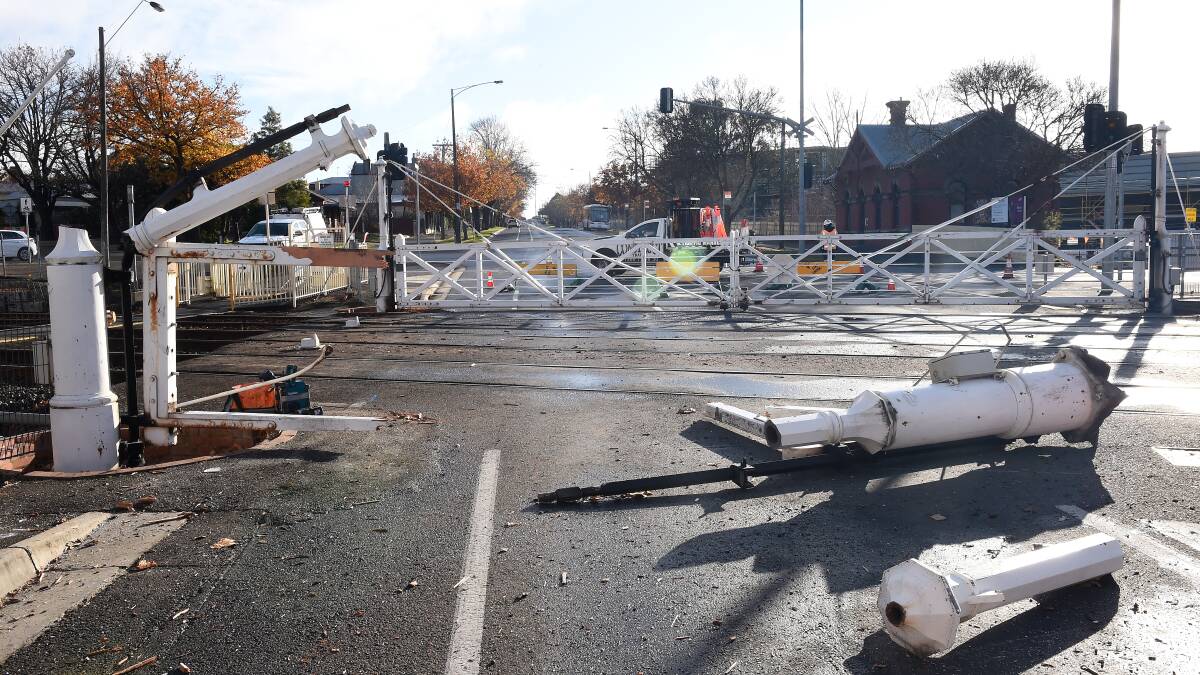 The wreckage after a train ran through the Lydiard Street gates in May 2020. Picture: Adam Trafford