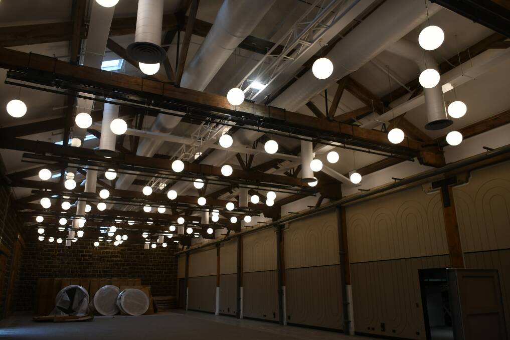 The lighting is a feature in the main space, which can seat hundreds of people.