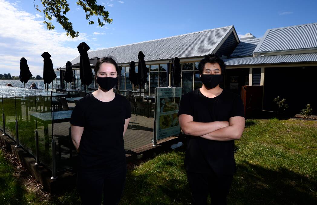 Responsibility: The Boatshed Restaurant's Ruby Treweek and Parintron Khieo-On are helping to keep people from Melbourne out of Ballarat venues. Picture: Adam Trafford