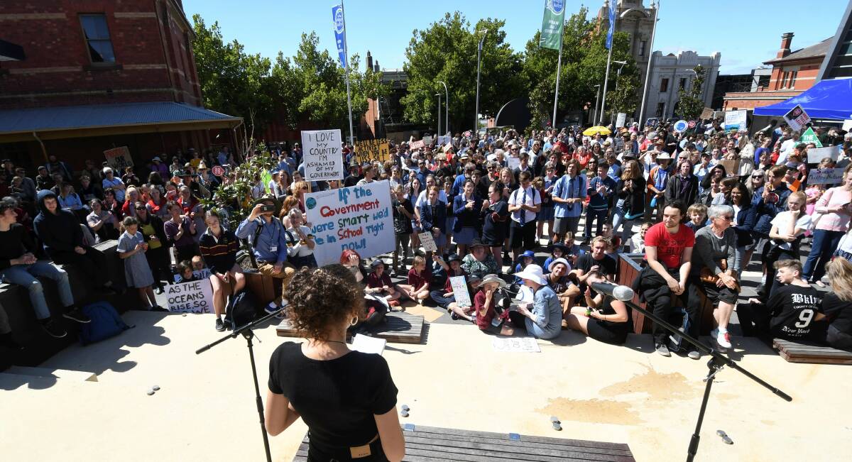Energy: 17-year-old Rosa Varga-Miller speaks to the crowd at the student climate strike. Pictures: Lachlan Bence