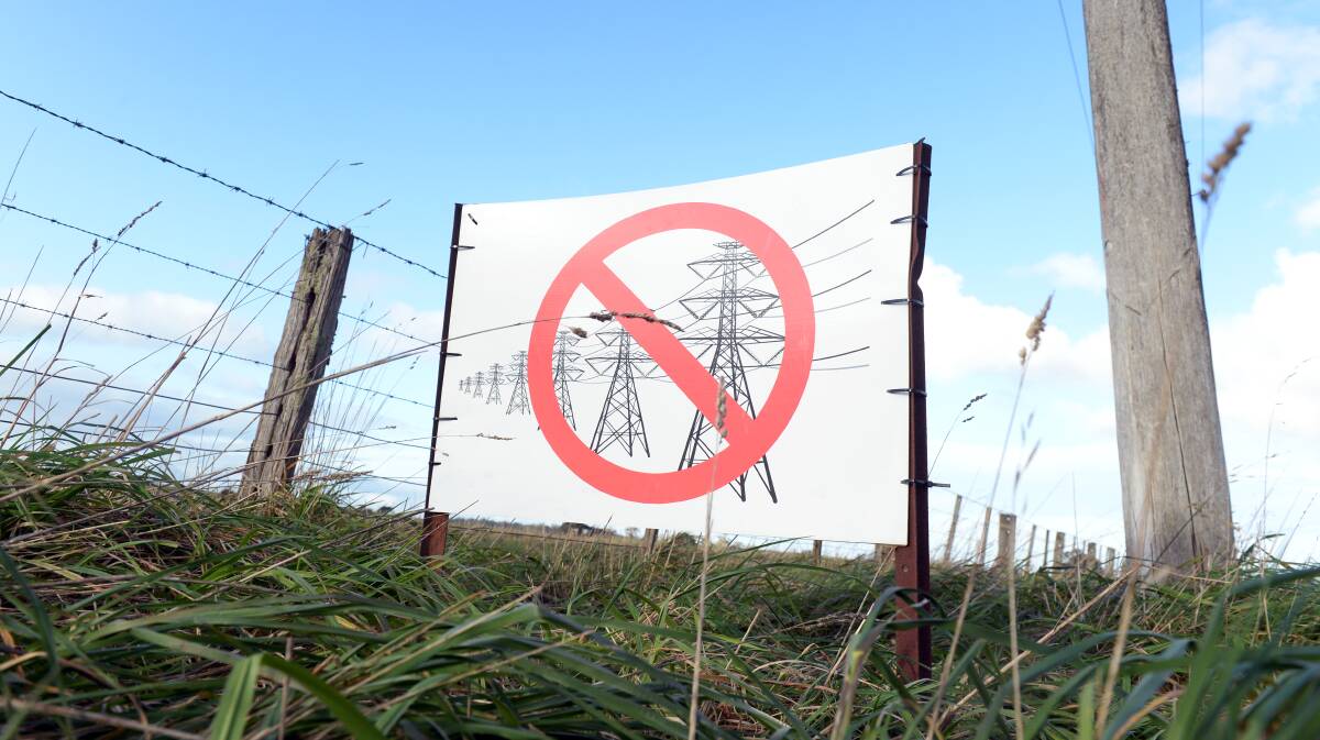An anti-powerline sign spotted near Ballarat. Picture: Kate Healy