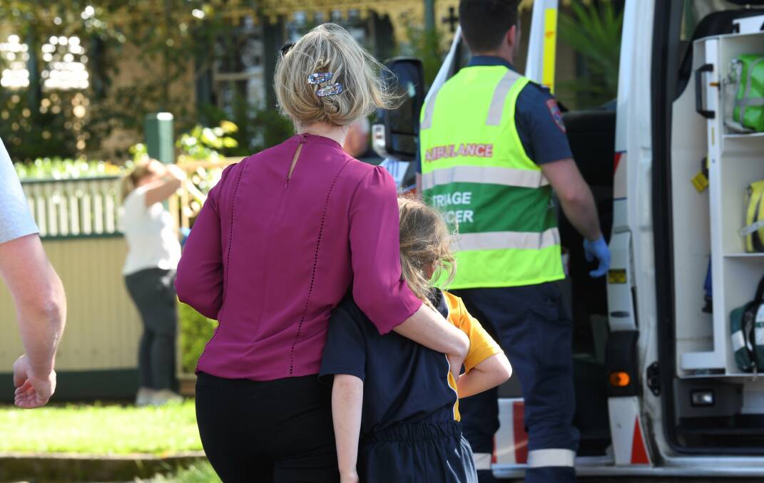 Witnesses at the scene. Picture: Lachlan Bence