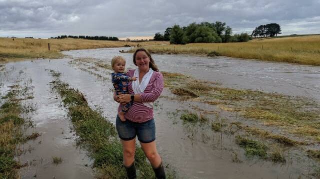 Katherine Myers in a flooded paddock. Picture: contributed