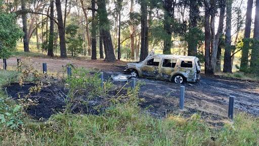 The burnt-out four-wheel-drive in Pryors Park. Picture by Gabrielle Hodson