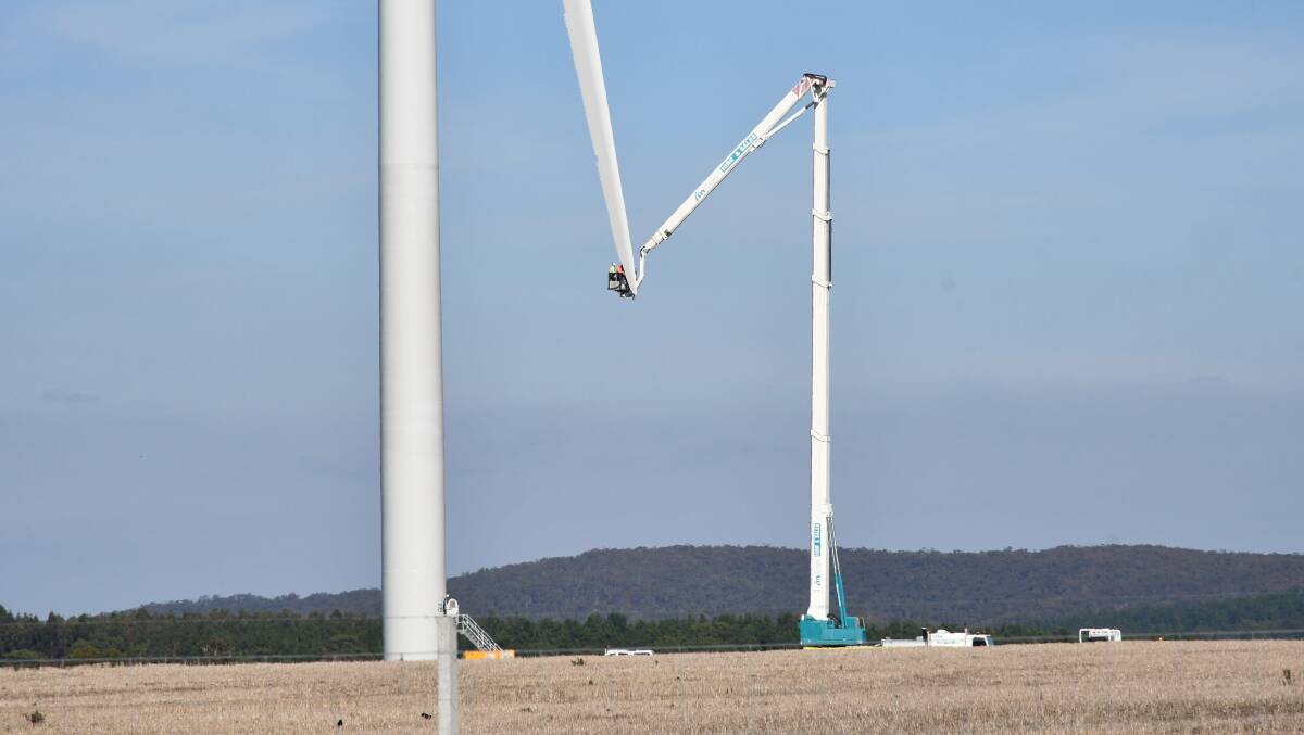Rush: Technicians installing a turbine at the Lal Lal Wind Farm near Yendon.