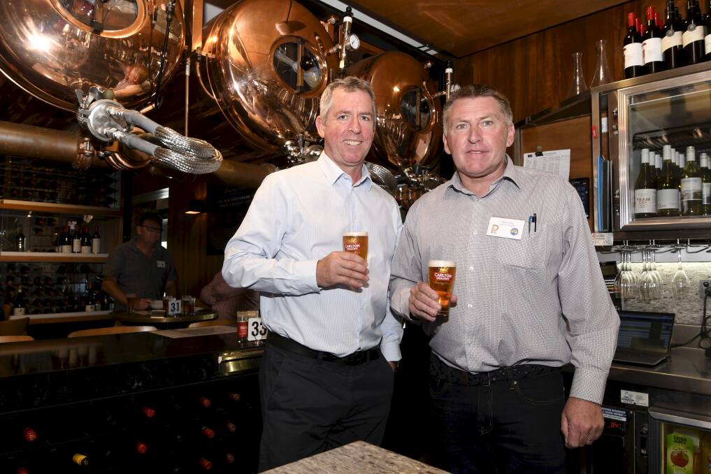 Cheers: AHA chief executive Paddy O'Sullivan and Victorian president Dave Canny at the Red Lion. Picture: Lachlan Bence