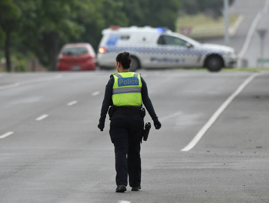 A police officer on the job in Ballarat. Picture: Lachlan Bence