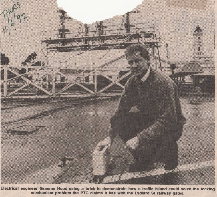 Graeme Hood at the station in 1992, working on a solution to keep the gates. Picture: The Courier