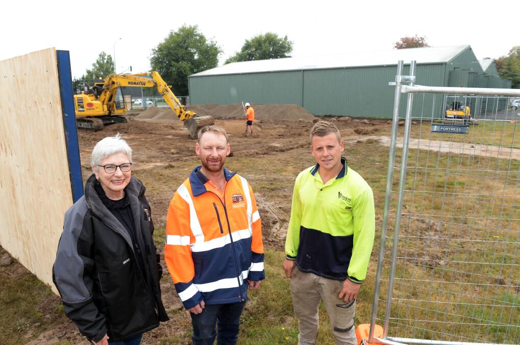 The Ballarat Tramway Museum's Virginia Fenelon and Paul Mong with MKM Construction's Stefan Pye. Picture: Kate Healy