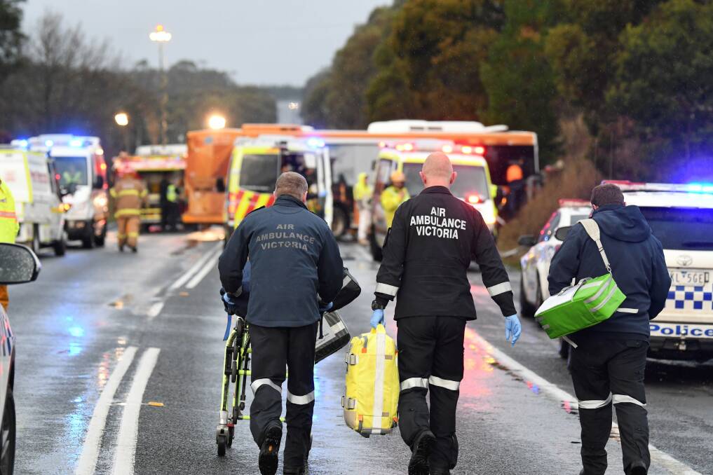 Fatal: Emergency crews at the scene of the crash on the Midland Highway in June last year. Picture: Lachlan Bence