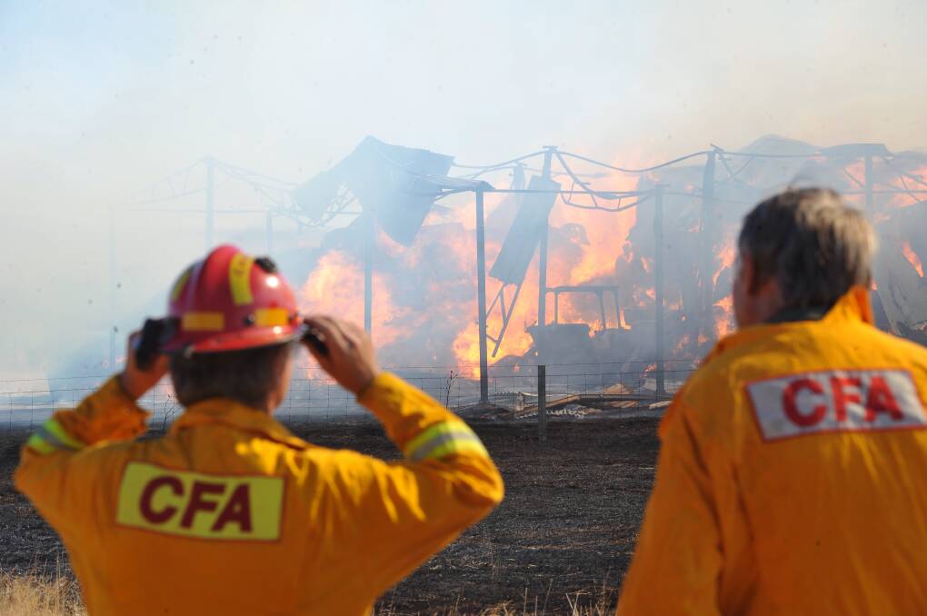 Baled up: A hay shed on fire near Learmonth. File photo