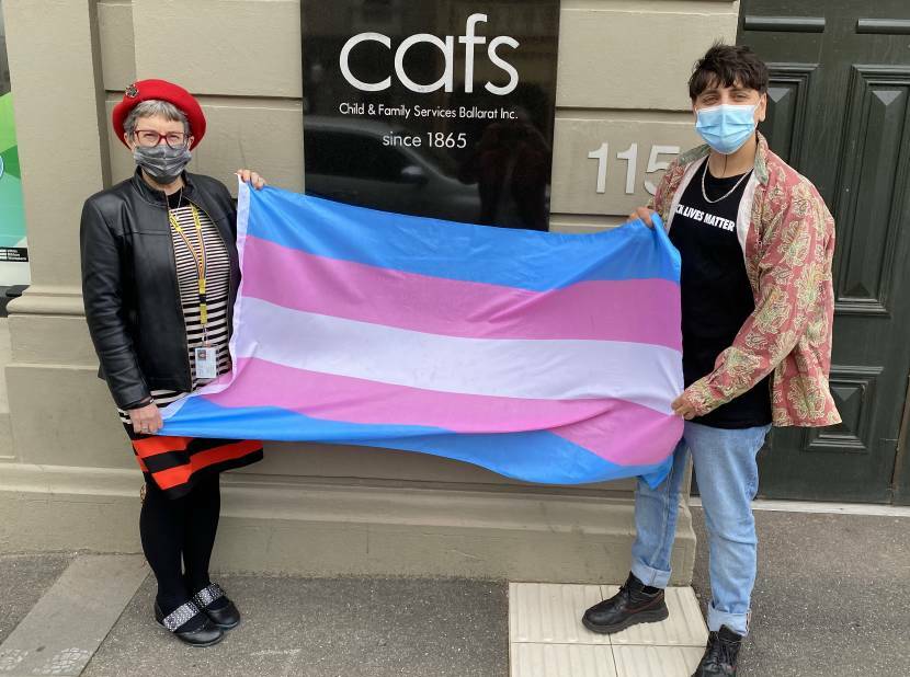 Cafs chief Wendy Sturgess and Sage Akouri with the transgender flag last year.