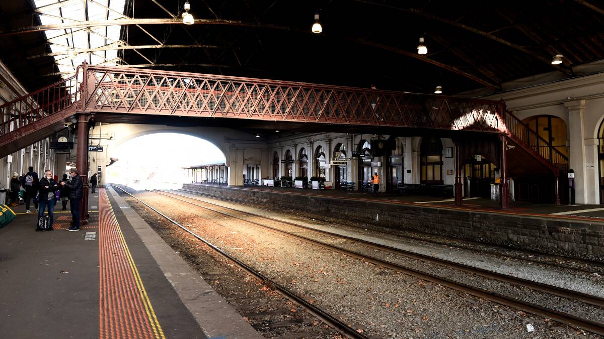 The wooden bridge between the platforms at the historic Ballarat train station. Picture by Adam Trafford
