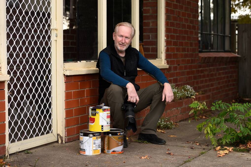 Portrait: Ballarat photographer Steve Barnes is planning a new project showing what families got up to during isolation - for example, he has been painting his house. Picture: Adam Trafford