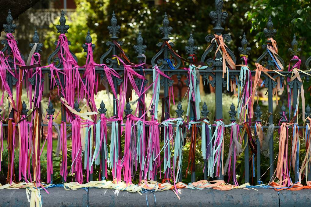 Ribbons tied to a fence in Ballarat. Picture: Adam Trafford