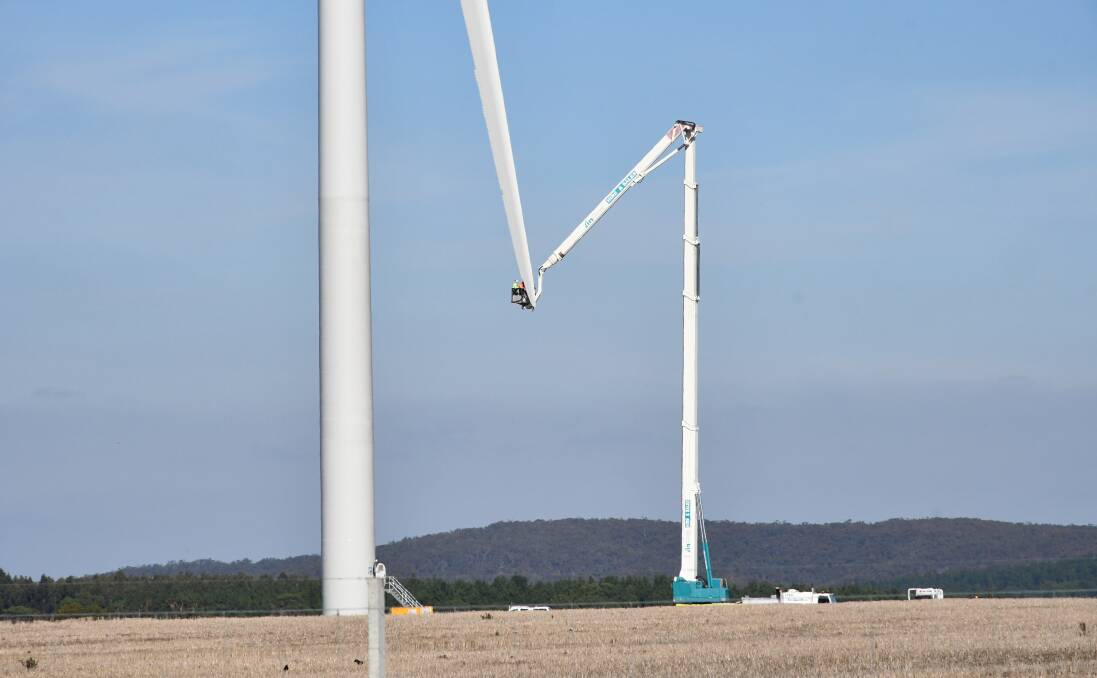 Lift: Workers assemble a turbine at the Lal Lal wind farm near Yendon last week.