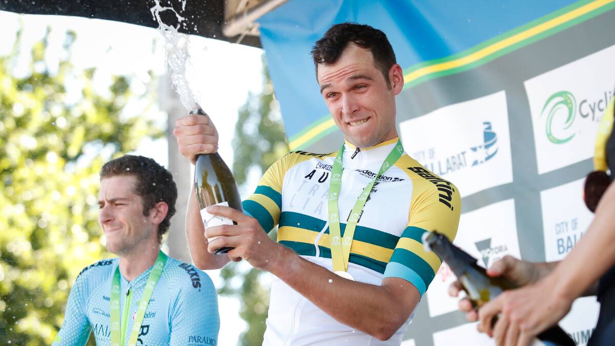 Champagne finish: National road race champion Michael Freiburg on the podium. Picture: Adam Trafford