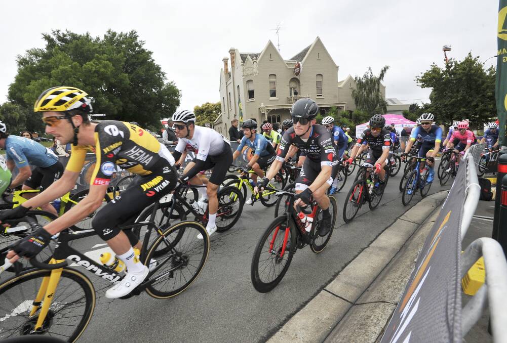 Booming: Riders in the elite men's road race get started in Buninyong on Sunday. Picture: Lachlan Bence