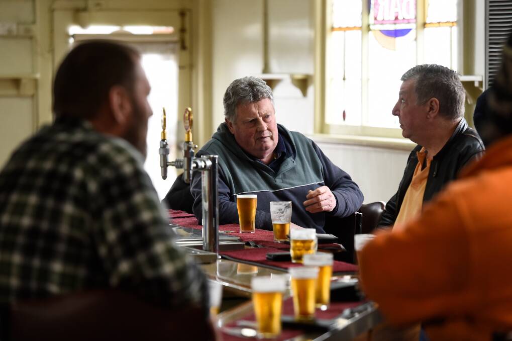 Cheers: Jack Dwyer enjoys an afternoon beer with mates at the Millers Arms on Doveton Street North.