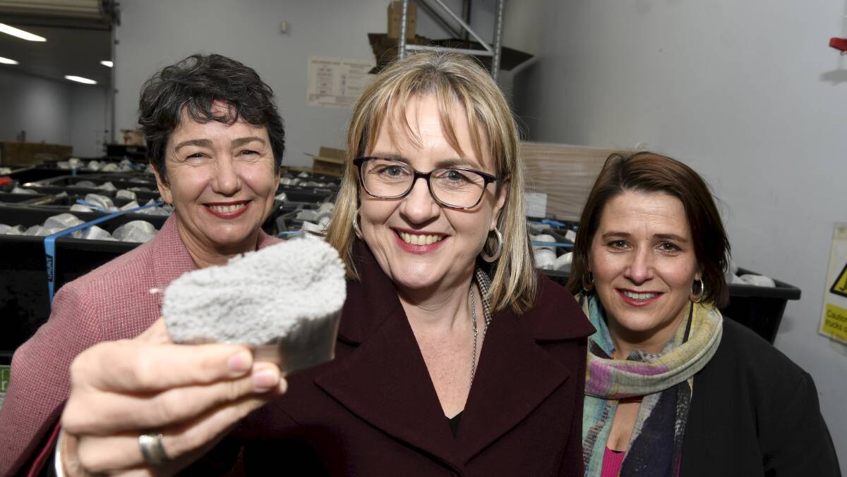 Acting premier Jacinta Allan holds a piece of eMesh, with Buninyong MP Michaela Settle and Wendouree MP Juliana Addison. Picture: Lachlan Bence