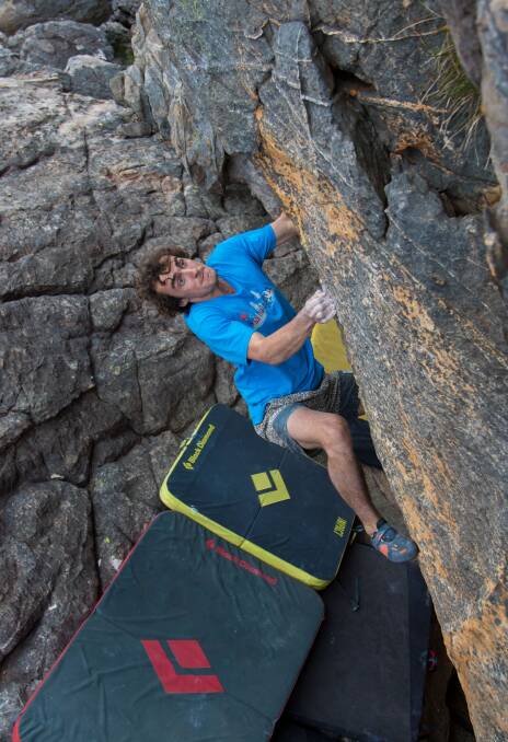 Stephen Waring navigates the Balthazar problem while bouldering at The Gallery. Picture: Ross Taylor