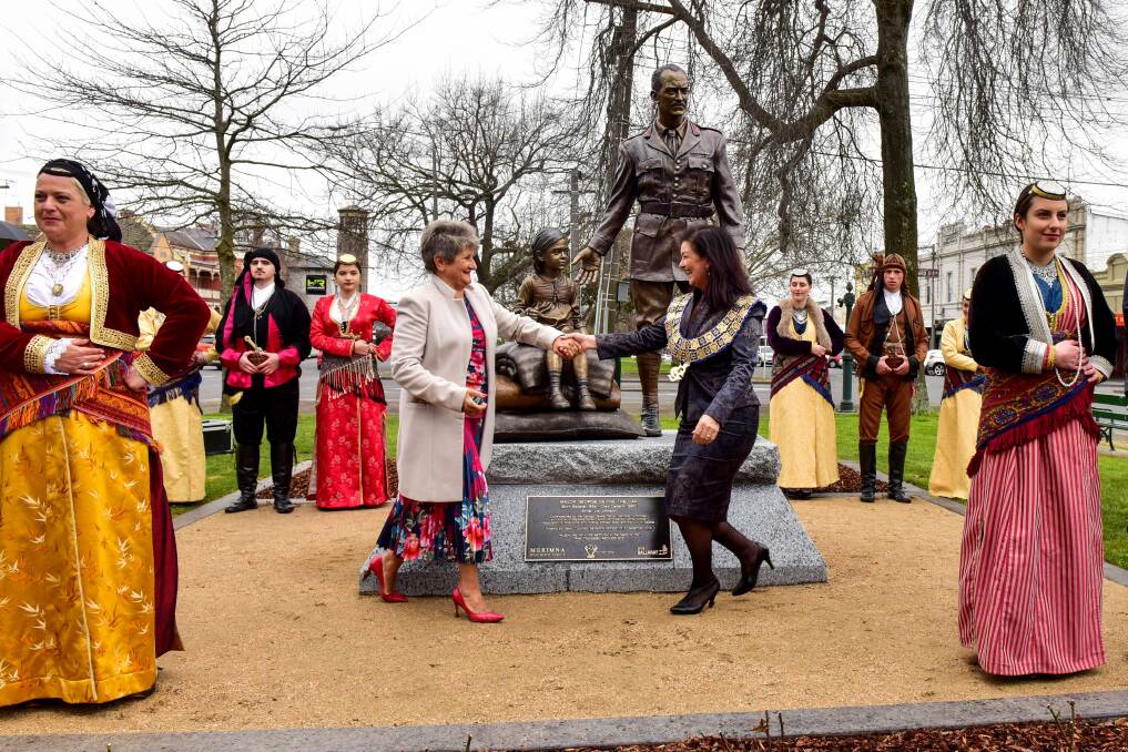 Honour: The statue of George Devine Treloar is unveiled on Sturt Street by committee chair Litsa Athanasiadis and City of Ballarat mayor Samantha McIntosh. Pictures: Brendan McCarthy