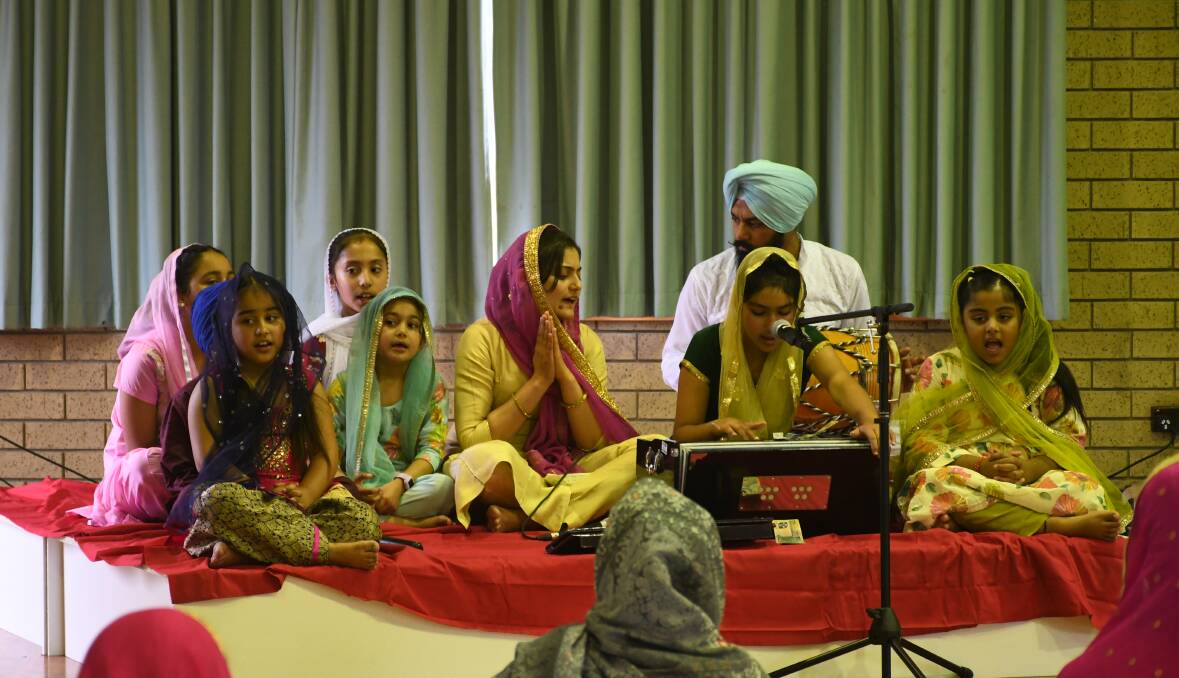 Celebrate: Children lead a song during Vaisakhi celebrations in Invermay.