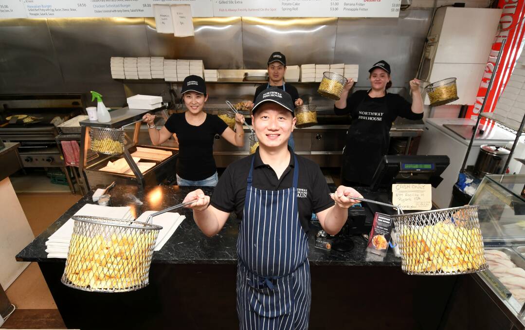 Chipper: Northway Fish House's Shaun Li, with his team (from left) Lisa Wan, Jack Li, and Chloe Bee, are ready to feed the masses. Picture: Lachlan Bence