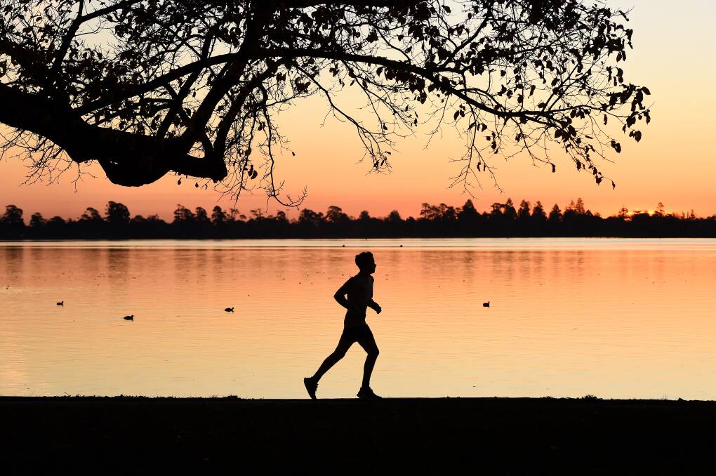 A runner around Lake Wendouree - this photo was taken about 6.20pm in May. Picture: Adam Trafford