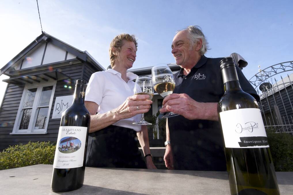 Cheers to that: RJM Wine Bar's Joan Miles and Roger Gooding are ready to open this week. Picture: Lachlan Bence