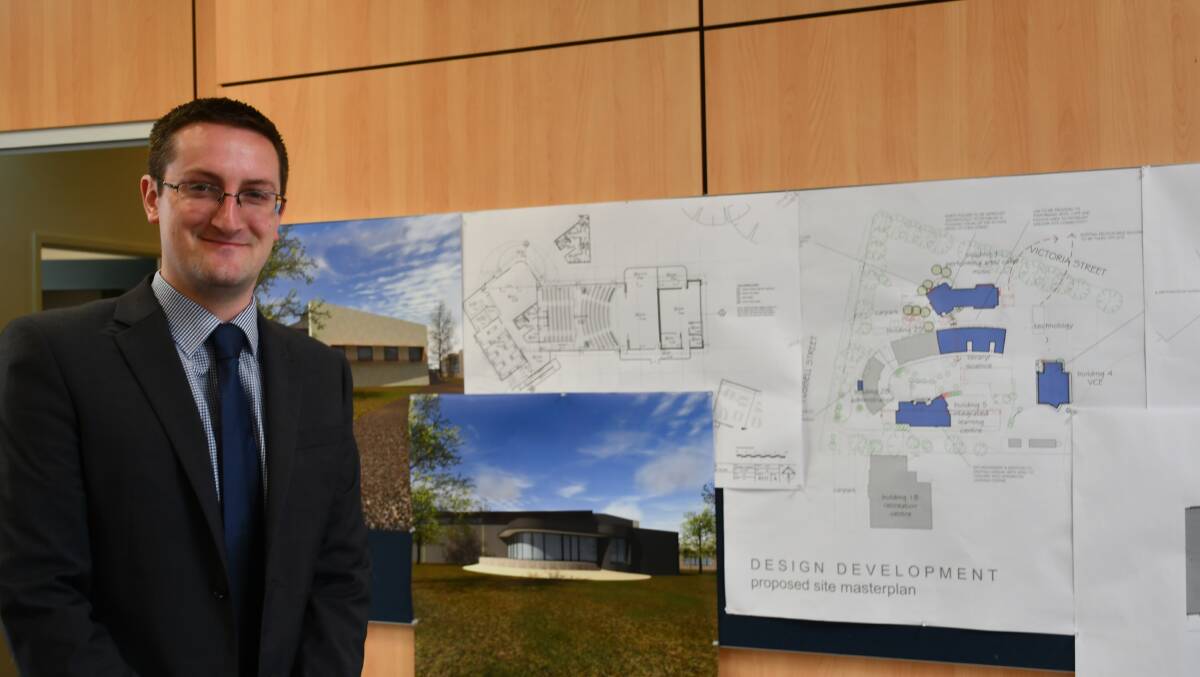 Woodmans Hill Secondary College principal Simon Haber with the plans for the new buildings.