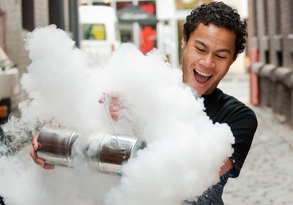 A member of Victoria University's Professor Science troupe with a dry ice experiment. Picture: contributed