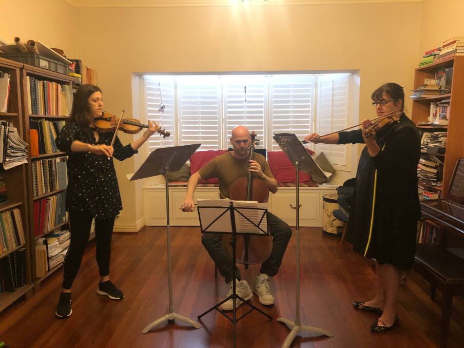Tuned up: Monica, Dan, and Sarah Curro rehearsing in Melbourne this week. Picture: supplied