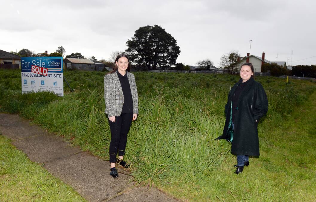 Potential: Jessica Tempany and Emily Hines on what could be the future site of a development for people with a disability. Picture: Kate Healy