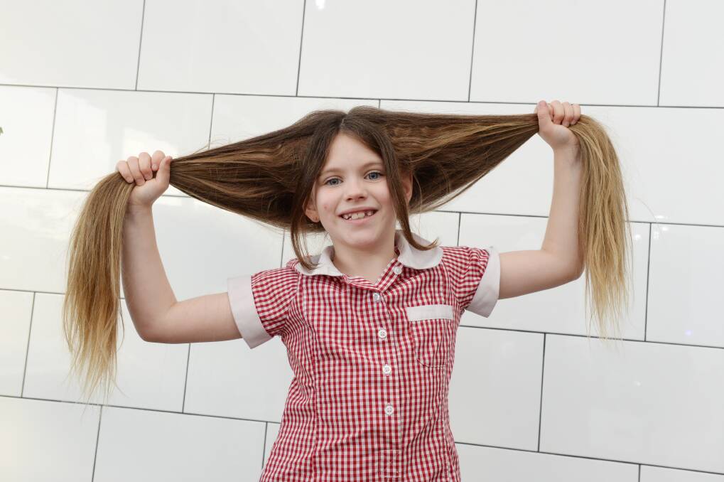 Helping out: Seven-year-old Ruby McLure will donate her locks to Wigs 4 Kids, to help children recovering from cancer treatment. Picture: Kate Healy