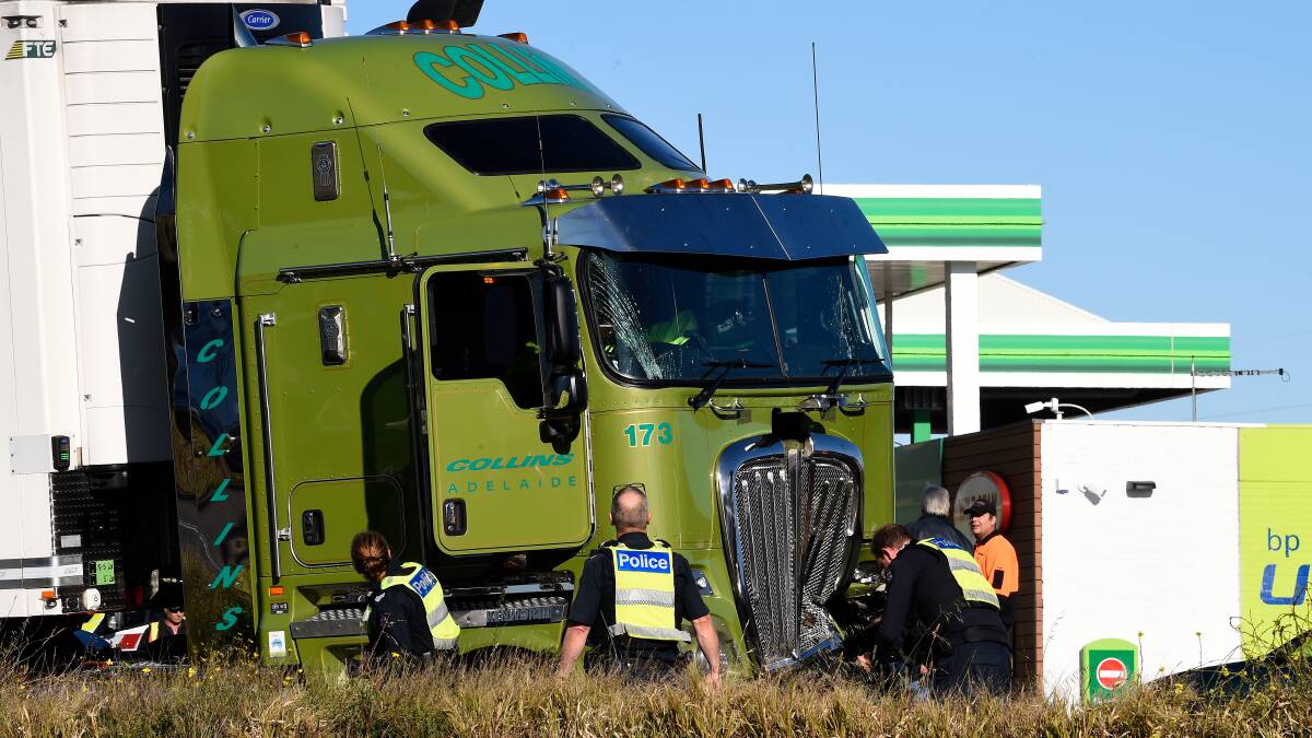 'Feel like I've cheated death': Lucky escape as trucks collide and crash into petrol station
