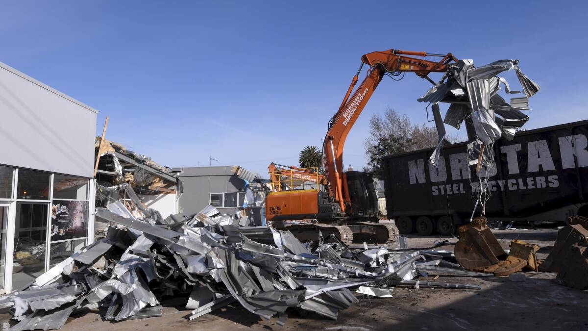 Demolition gets under way. Picture: Lachlan Bence