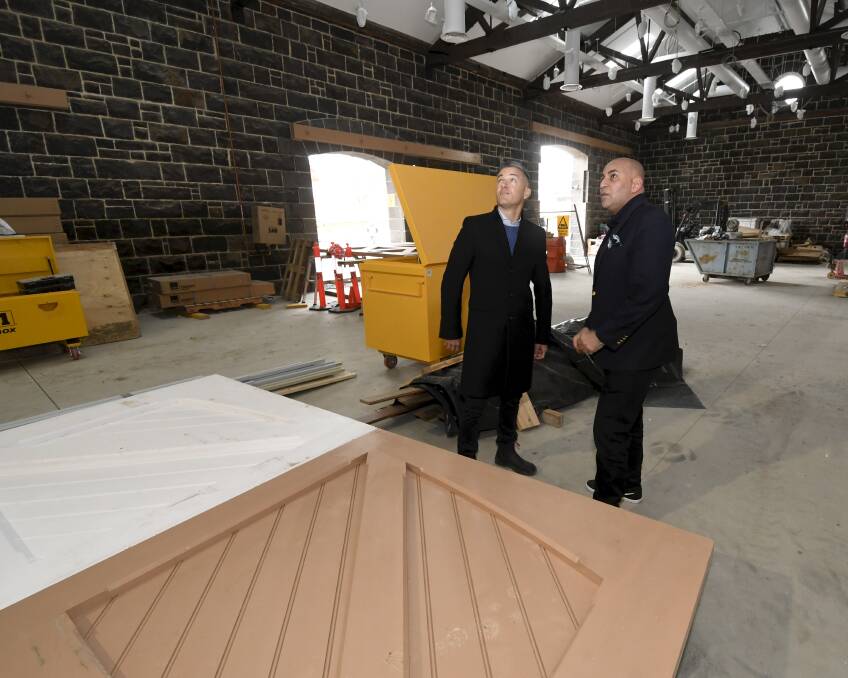 Big things: Pellicano's Nando Pellicano and the Atlantic Group's Hatem Saleh inside the Goods Shed. Pictures: Lachlan Bence