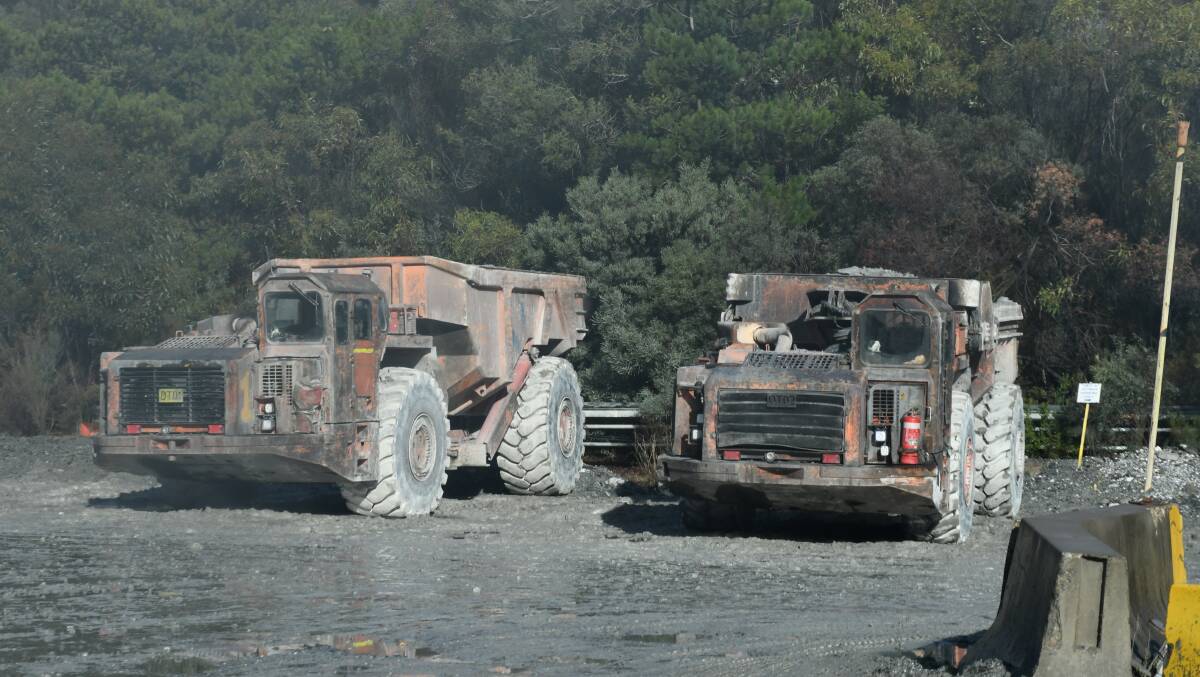 Mine vehicles outside the entry portal in 2019. File photo